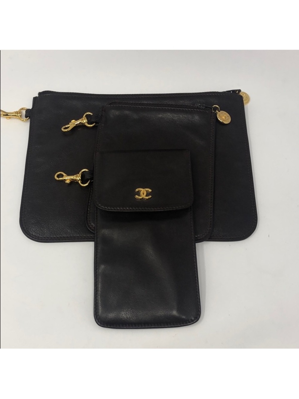 CHANEL Black Leather Multi-Pouch Wristlet with Gold CC Hardware